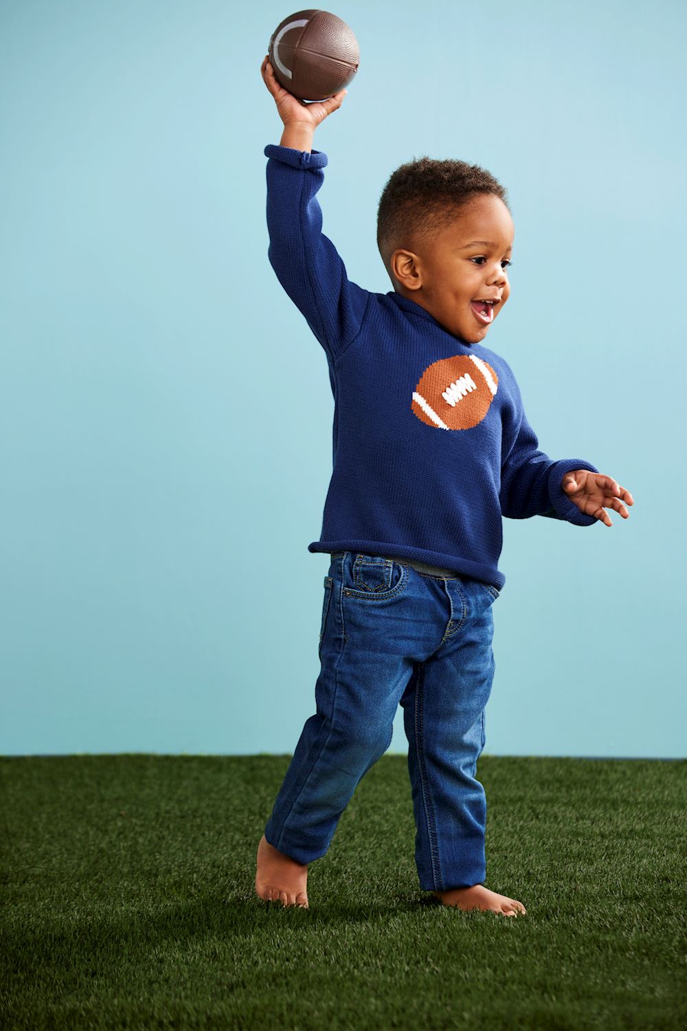 FOOTBALL ROLLNECK SWEATER BY MUD PIE